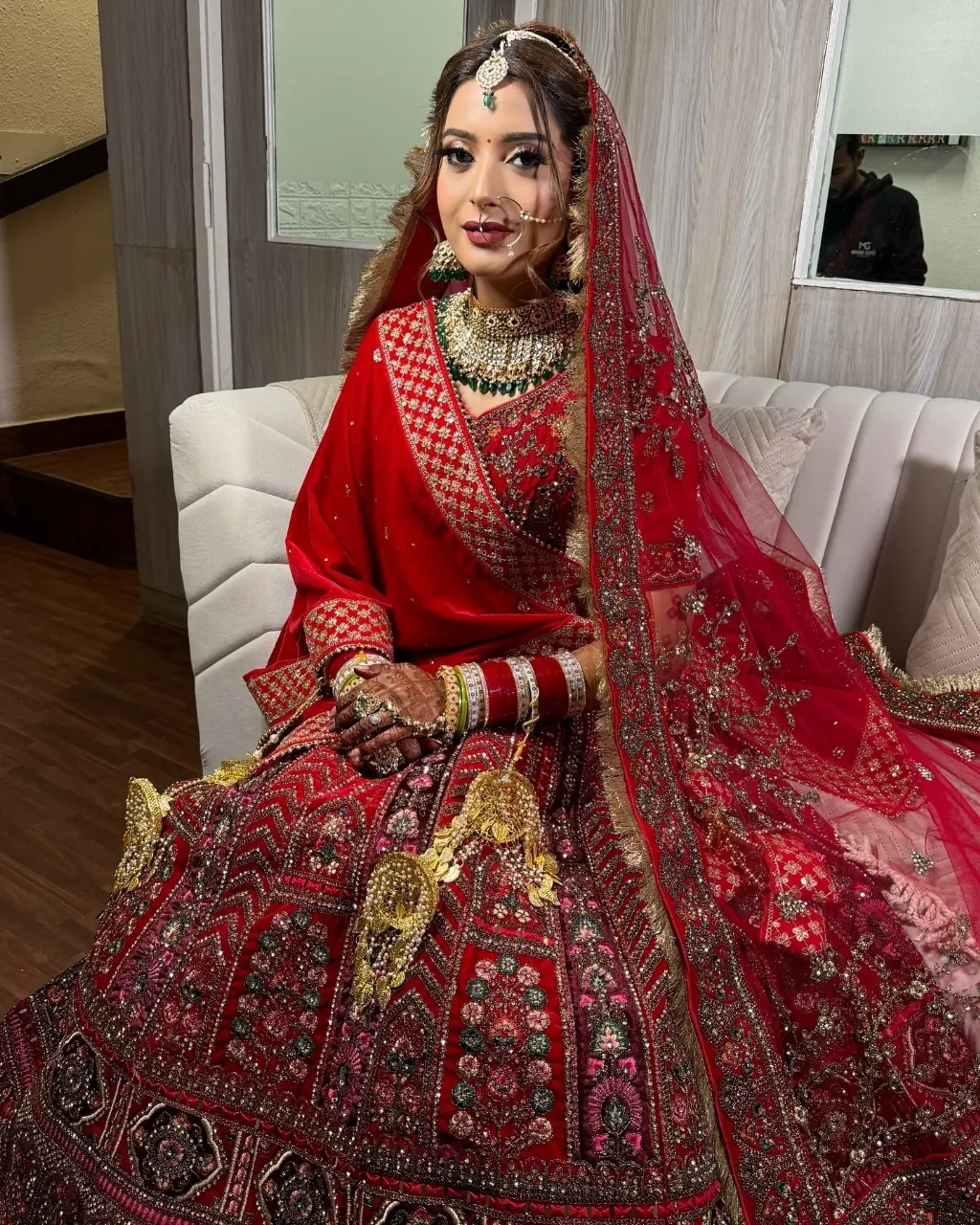 Mansi, Red Veil. Bridal makeup by Madhu Gupta at MG Makeovers, Gurugram